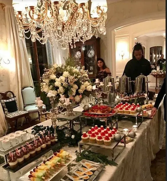 Dessert and canape buffet under a chandelier